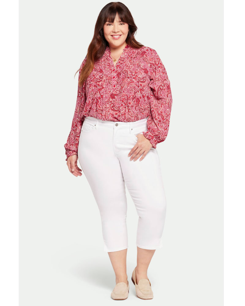 Front of a model wearing a size 14W Chloe Capri Pants in Optic White by NYDJ. | dia_product_style_image_id:296923